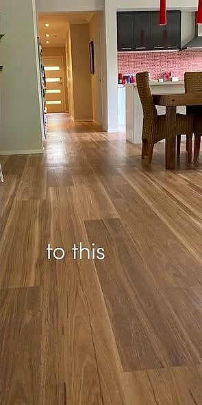 After: warm timber-look flooring through the hallway